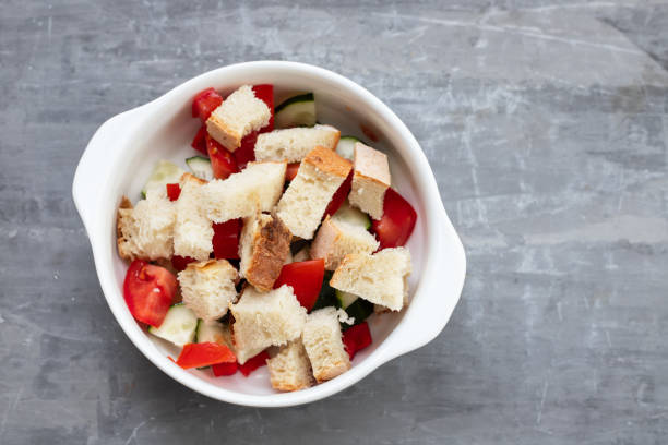 istock cold tomato soup gaspacho with bread in white bowl 1278955784