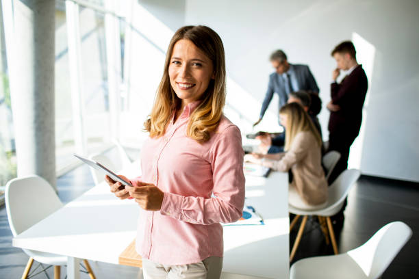 istock Young business woman using digital tablet in the office 1278955849