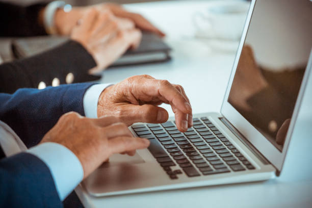 istock Senior businessmen using laptop 1278956051