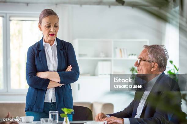 Shareholders During Business Meeting Stock Photo - Download Image Now - 65-69 Years, 70-79 Years, Active Seniors