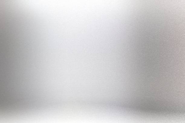 istock Glowing gray silver paper wall with copy space, abstract texture background 1278957778