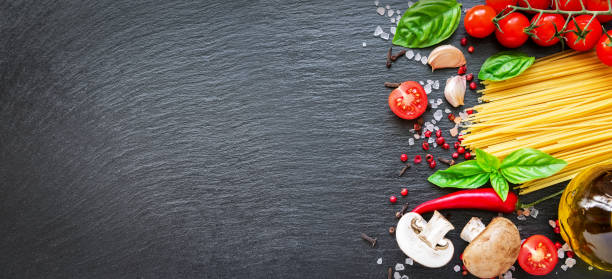 istock Food ingredients on dark background. 1278958713