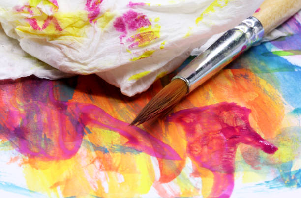 istock close-up brush and paint on colored background 1278960355