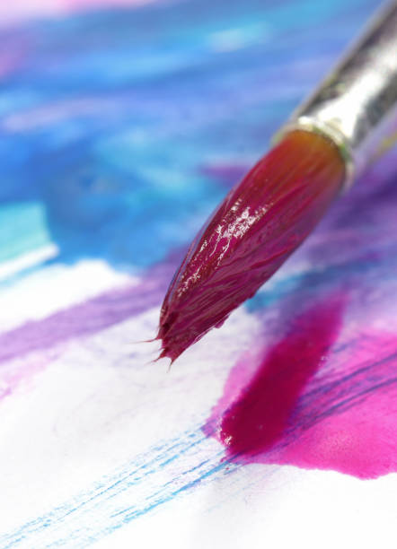 istock close-up brush and paint on colored background 1278960534