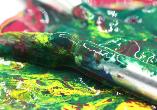 istock close-up brush and paint on colored background 1278962144