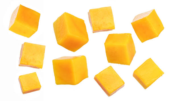 istock Set of mango cubes isolated on a white background. 1278966923