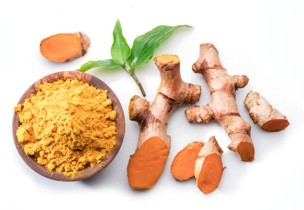 istock Fresh turmeric rhizome and turmeric powder isolated on white background. 1278968691