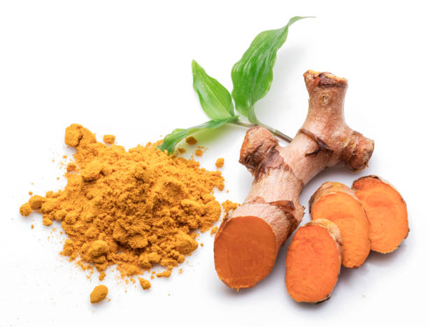 istock Fresh turmeric rhizome and turmeric powder isolated on white background. 1278968903