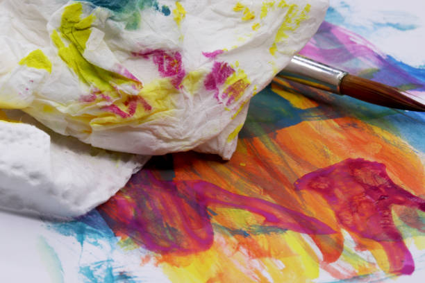 istock watercolor paints with brush background 1278971624