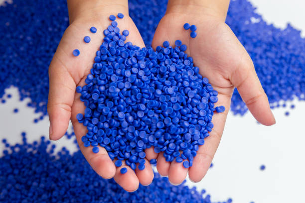 istock Close-up of plastic polymer granules. hand hold Polymer pellets. polymer plastic. compound polymer. 1278973463