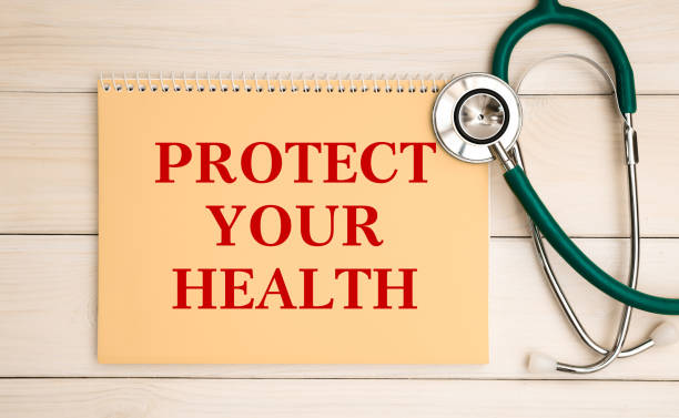 istock Card with text Protect Your Health and stethoscope 1278975006