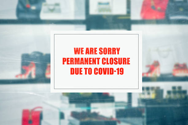 istock message on a luxury boutique announcing the closure due to the coronavirus 1278975511