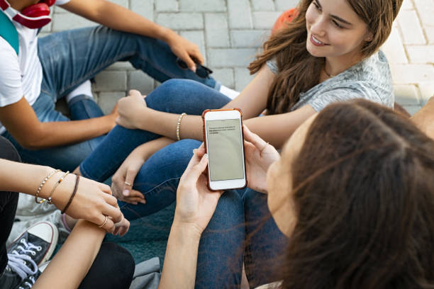 istock Girl messaging on smart phone with friends 1278975521