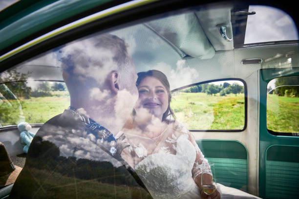 istock Wedding couple sitting in car 1278977320