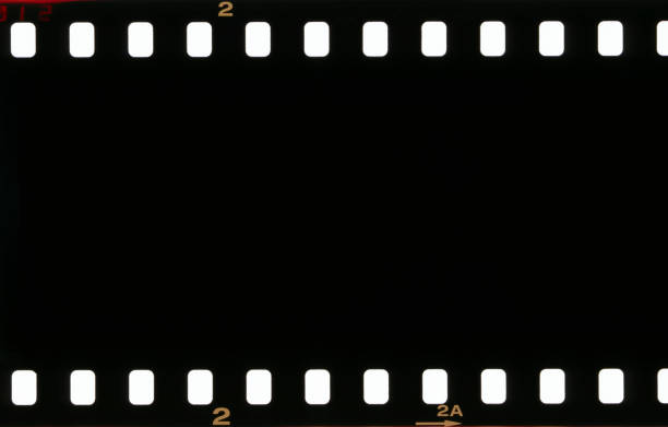 Vintage 35mm filmstrip Vintage 35mm filmstrip on a white background film camera overlay stock pictures, royalty-free photos & images