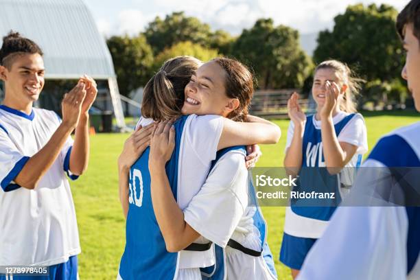 Girls Soccer Players Celebrating Victory Stock Photo - Download Image Now - Sport, Soccer, Teenager