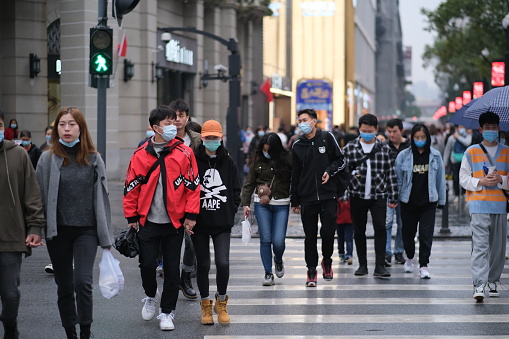 Wuhan/China-Oct.6th 2020:people in face mask to prevent coronavirus, walking on Jianghan Road. Jianghan Road is a famous commercial street in Wuhan