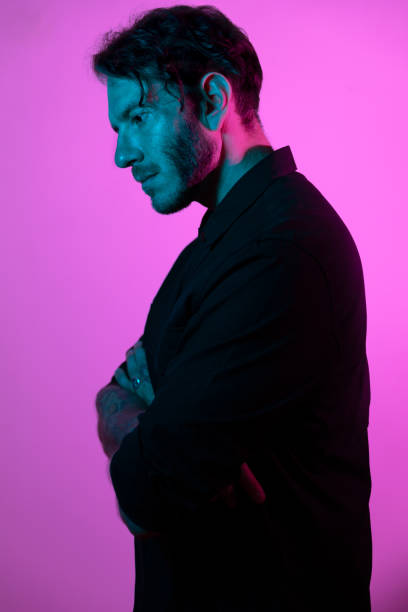 istock Portrait of men neon light 1278980143
