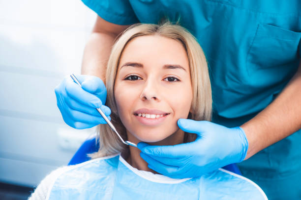 istock Dentist examinating girl 1278981697