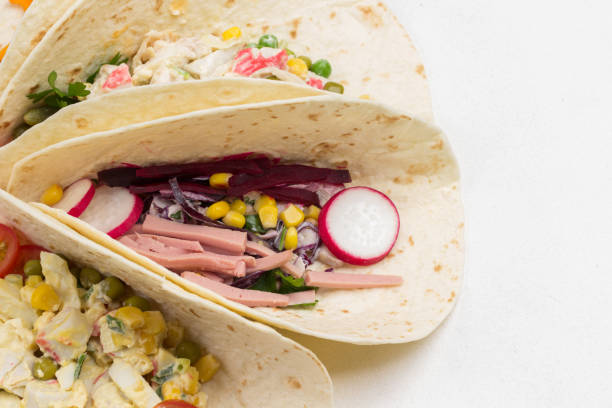 istock Vegetarian taco wraps. Vegetable tacos filled with various vegetables. 1278982724
