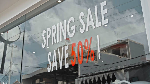 istock Text on a glass window labeled spring sale save 50 1278983175