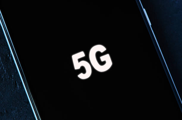 istock 5g symbol on a black smartphone screen. Global high-speed network. 1278990111