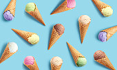 Colorful ice cream pattern on blue background