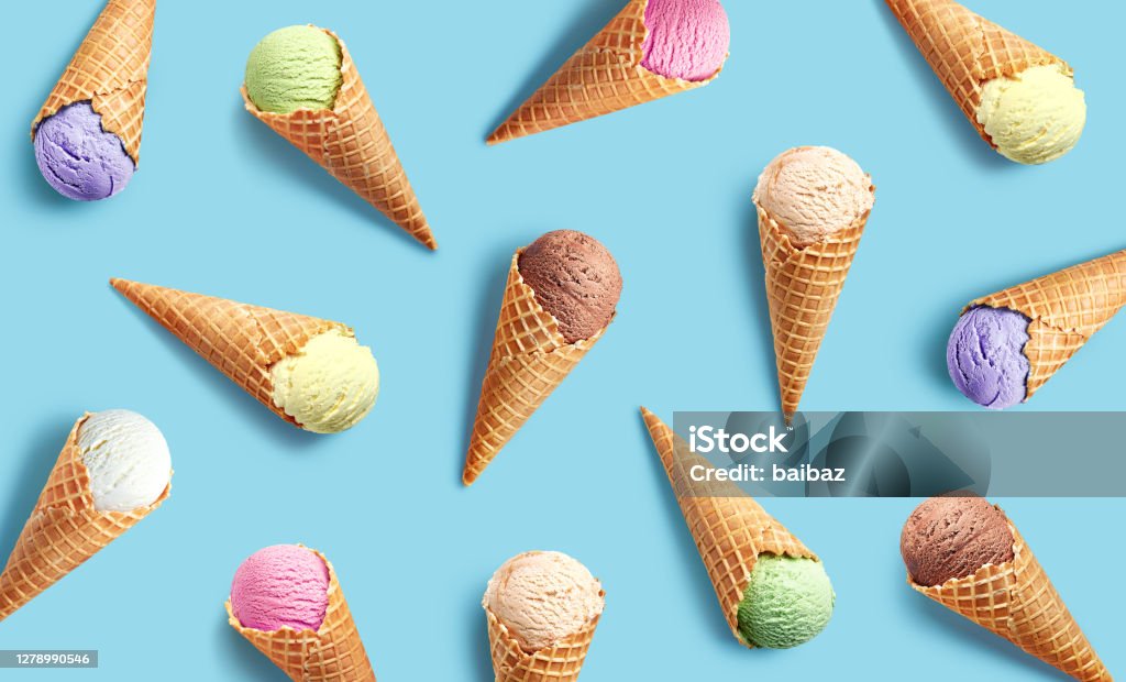 Colorful ice cream pattern on blue background Colorful ice cream pattern on blue background, top view, flat lay Ice Cream Stock Photo