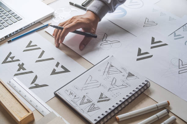istock Graphic designer creative design sketch drawing logo Trademark brand Workspace 1278991843