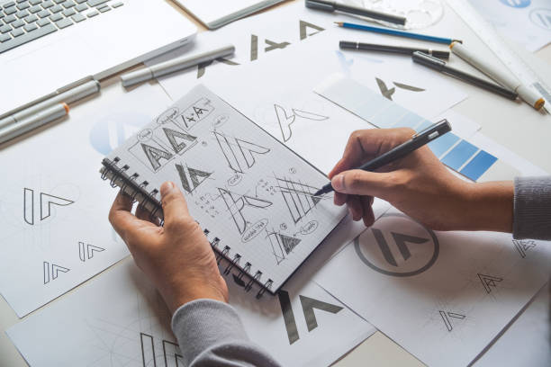 istock Graphic designer creative design sketch drawing logo Trademark brand Workspace 1278991846