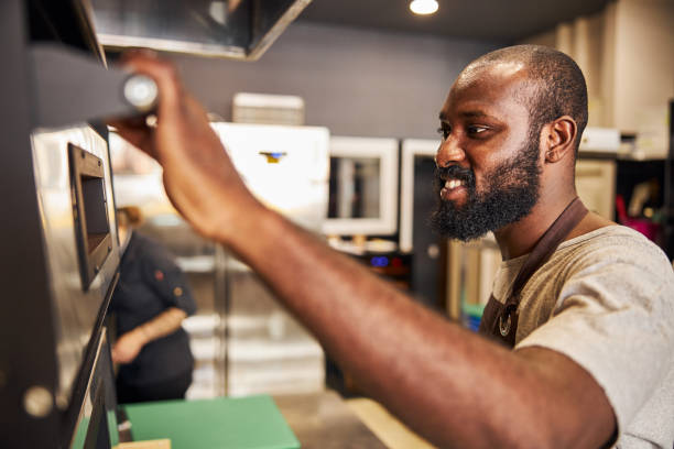istock Merry bearded man enjoying baking in restaurant 1278994694