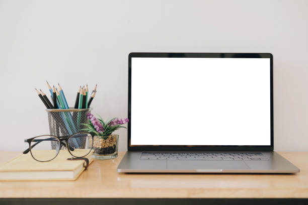 istock Blank screen Laptop computer and poster workspace background in modern office 1278997374
