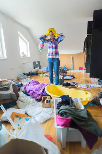istock Woman cleaning mess at home 1278997622