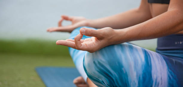 istock Hands of a young woman in a mudra position 1279001676