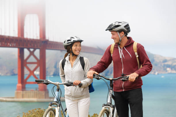 istock Biking Golden Gate Bridge - couple sightseeing 1279003946