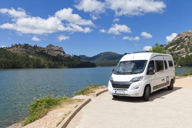 motor home for journey with the family van and motor home for summer vacations in the mountains of sardinia in italy family-van-driving stock pictures, royalty-free photos & images