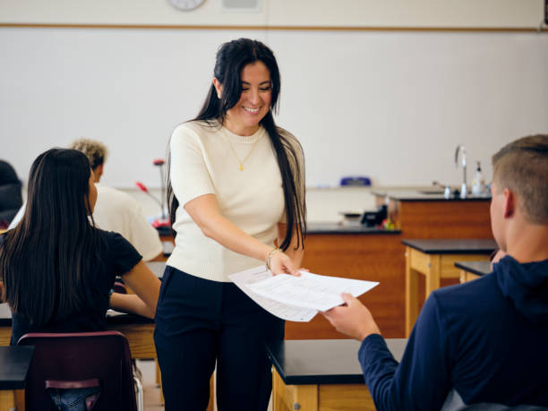 istock High School Teacher and Students In Classroom 1279004127