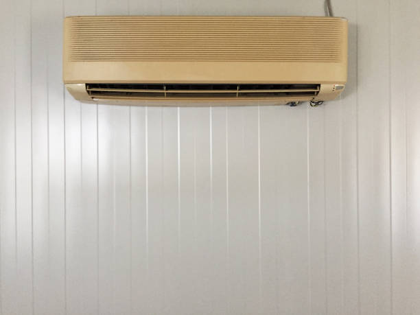 istock Old air conditioner on the metal wall background with copy space 1279004491