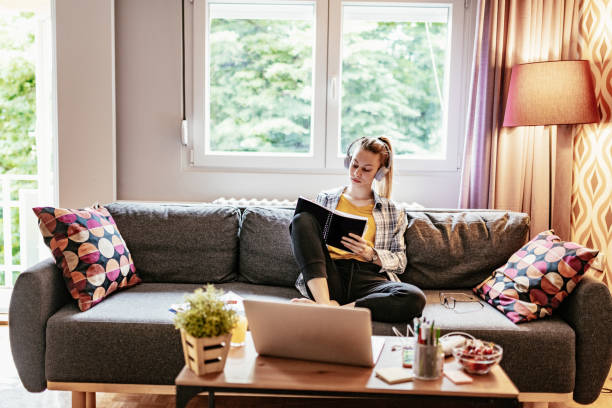 istock Student working on laptop at home during pandemic lockdown 1279006913