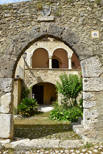 Arpino, Italy, 06/22/2020. Entrance arch in the courtyard of a medieval house in a village in the province of Frosinone.