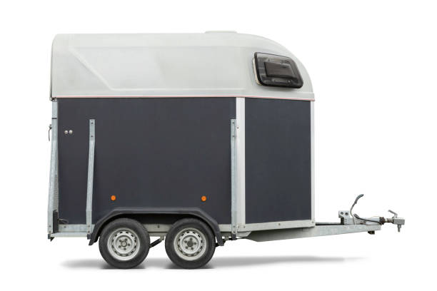 istock Side view of horse trailer isolated on white 1279009609