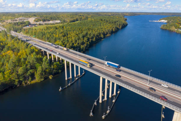 Aerial view over swedish highway Aerial view over a bridge (Stäketbron) crossing lake Mälaren on E18 (European Route E18) near Stockholm, Sweden. lake malaren photos stock pictures, royalty-free photos & images