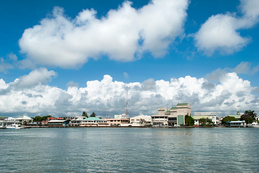 Cloudy blue sky over Belize City skyline (Belize).
