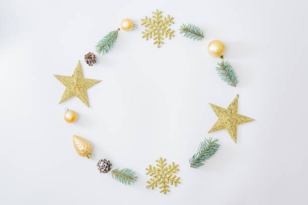 istock Flat lay frame with fir branches, christmas baubles decoration and snowflakes on a white background 1279012783