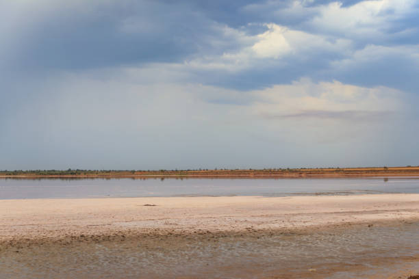 istock Dark storm clouds over a salt lake before a rain 1279014003