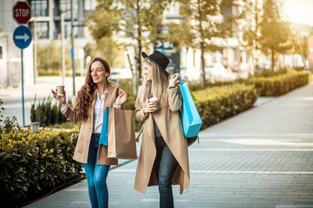 istock Woman shopping together 1279015019