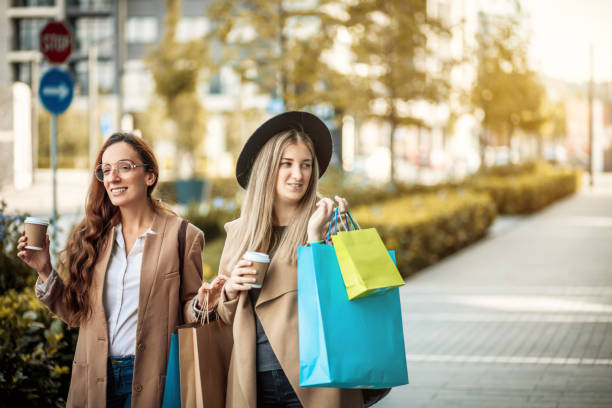 istock Woman shopping together 1279015123