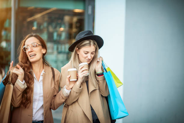 istock Woman shopping together 1279015126