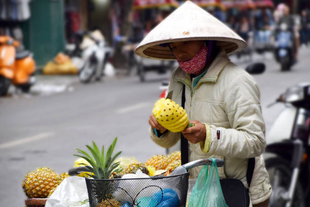 Yellow Peeled pineapple on street market in Cambodia