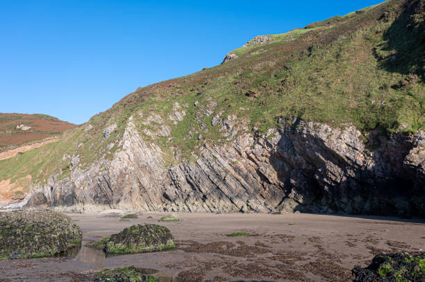istock Black Rock Limestone, Rhossili Bay, Gower Peninsula, Wales 1279017973